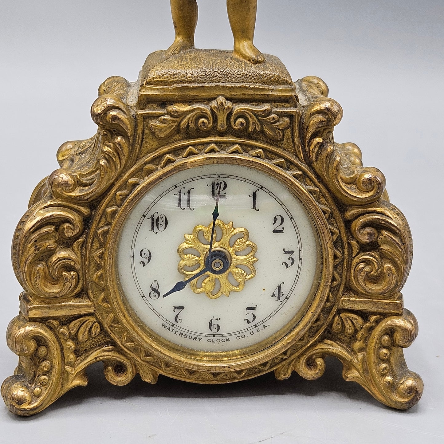 Antique Gilt Ormolu Metal Clock by Waterbury Clock Co USA with Cherub