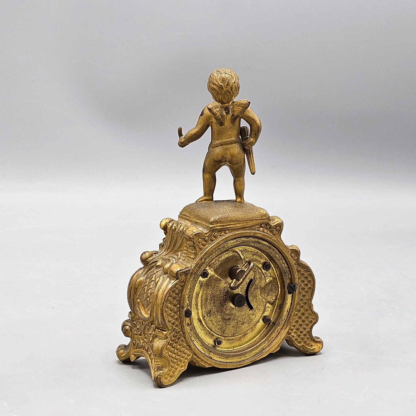 Antique Gilt Ormolu Metal Clock by Waterbury Clock Co USA with Cherub