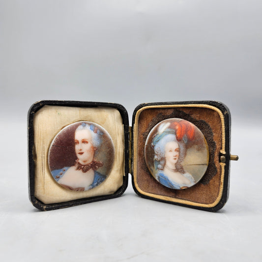 Pair Porcelain Portrait Miniatures Mounted in Leather Case