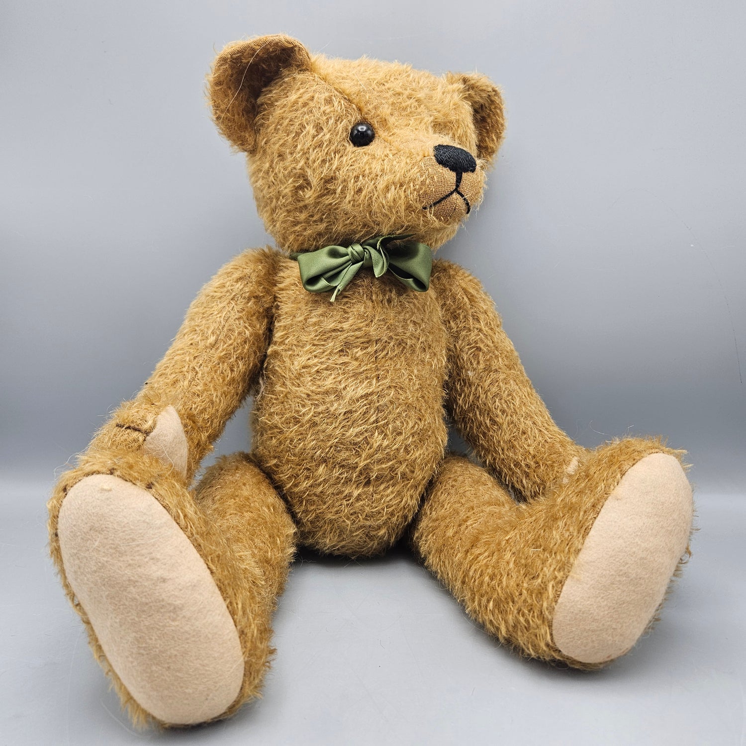 Jointed teddy bear with growler on sale