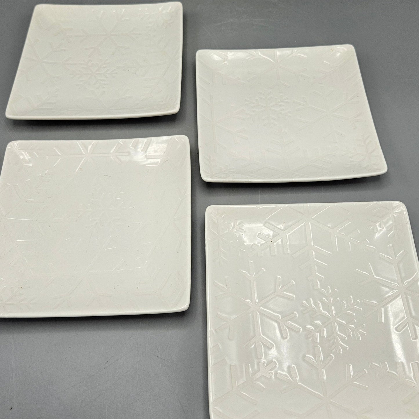 Crate & Barrel "Flurry" White Snowflake Plates - Set of Four