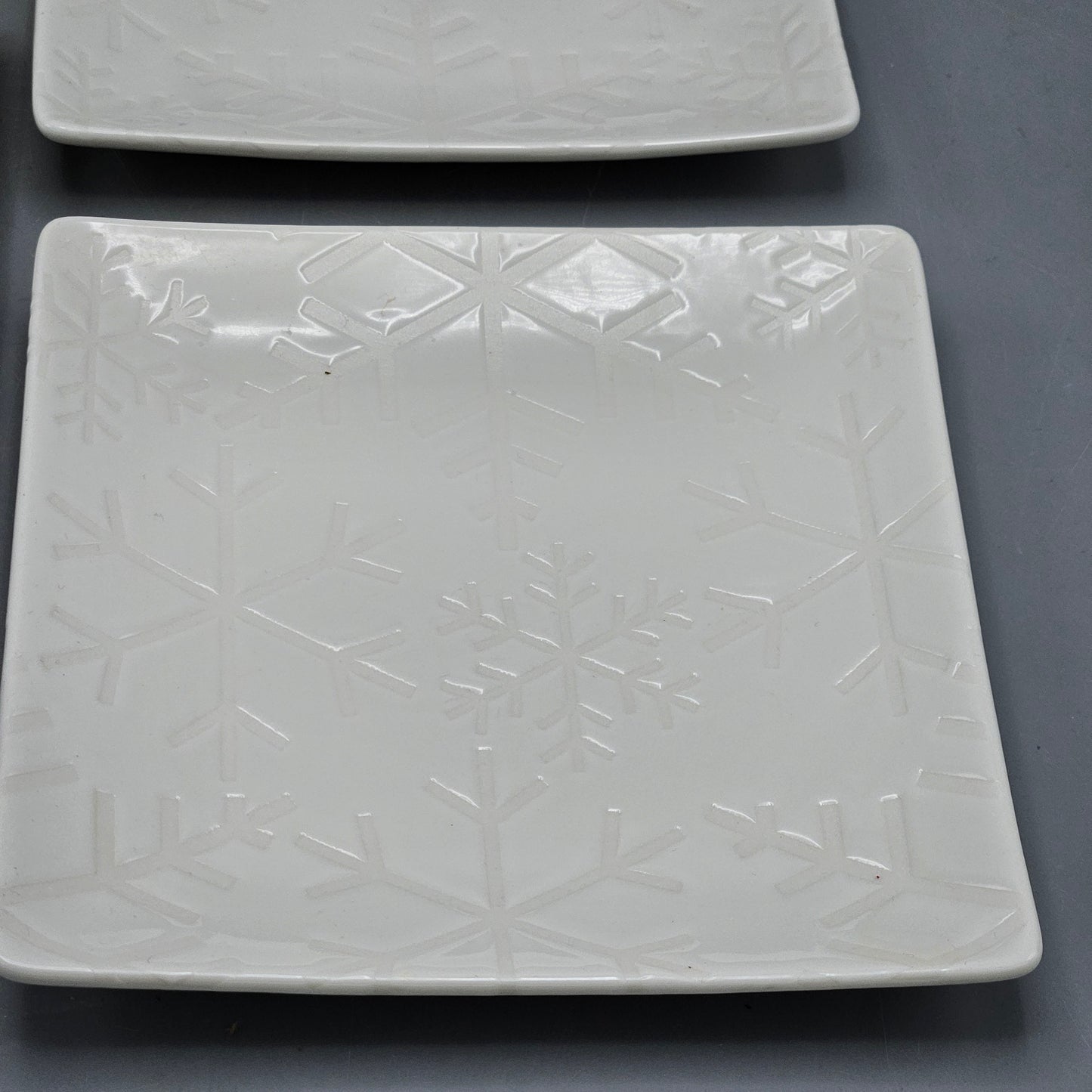 Crate & Barrel "Flurry" White Snowflake Plates - Set of Four