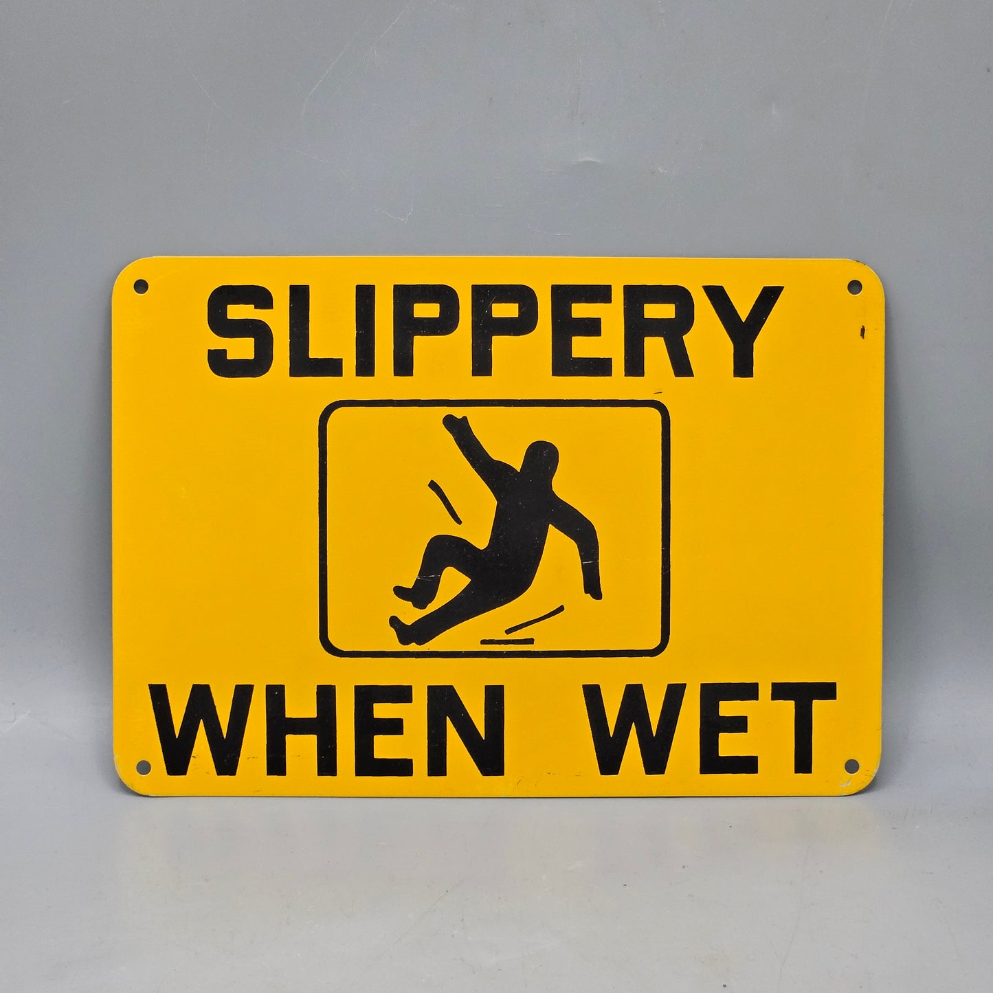 Vintage "Slippery When Wet" Metal Safety Sign