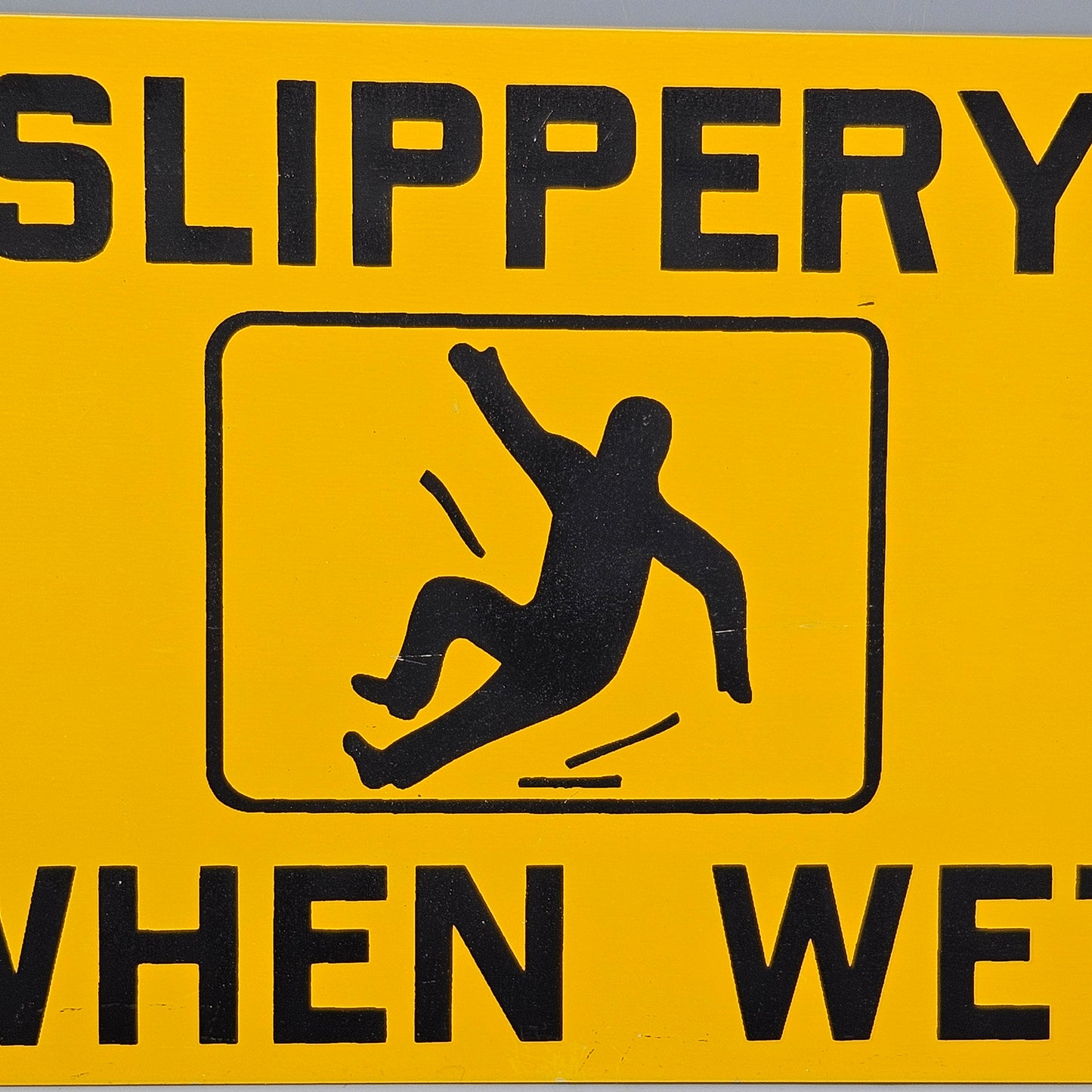 Vintage "Slippery When Wet" Metal Safety Sign